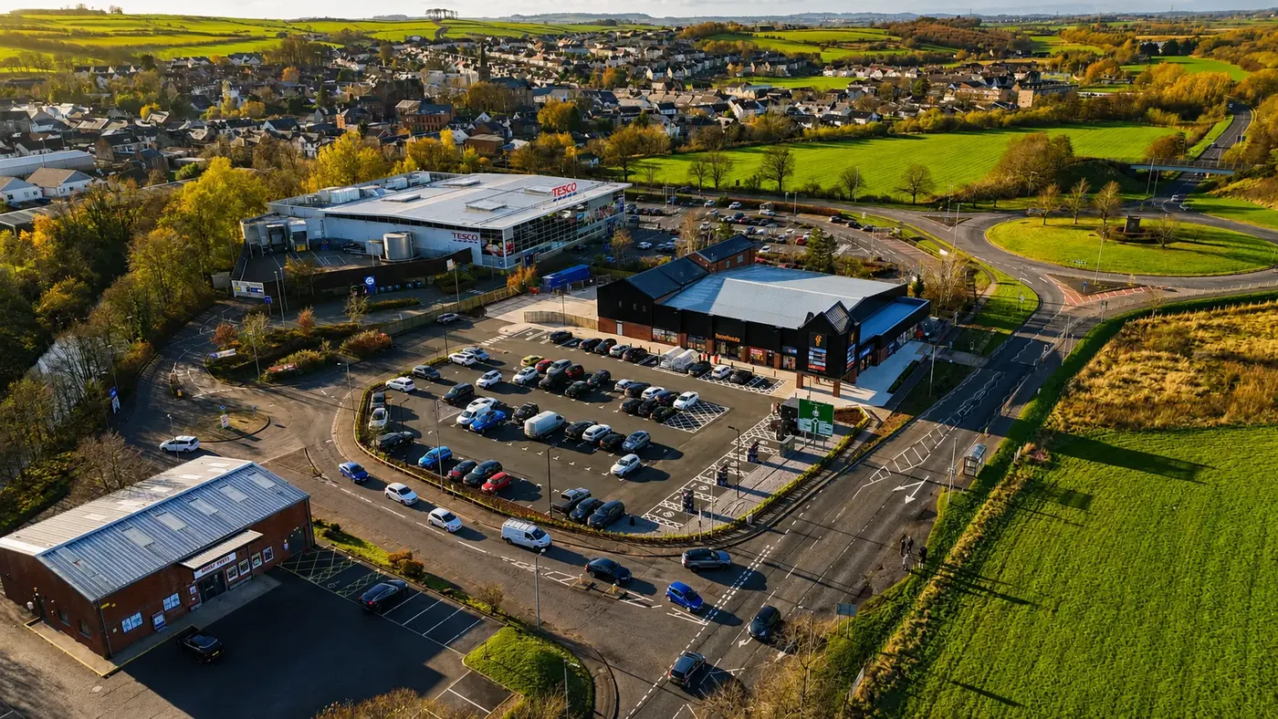 Aerial view of Loudoun Retail Park beside the A71 and Tesco Superstore